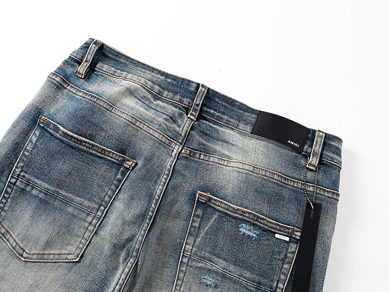 AMIRI Light Blue Distressed Letter Graphic Jeans ¡ª detail