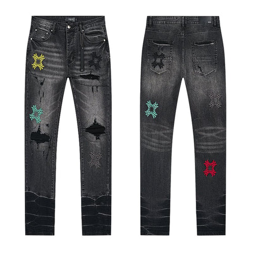 AMIRI Black Distressed Embroidered Jeans ¡ª hero