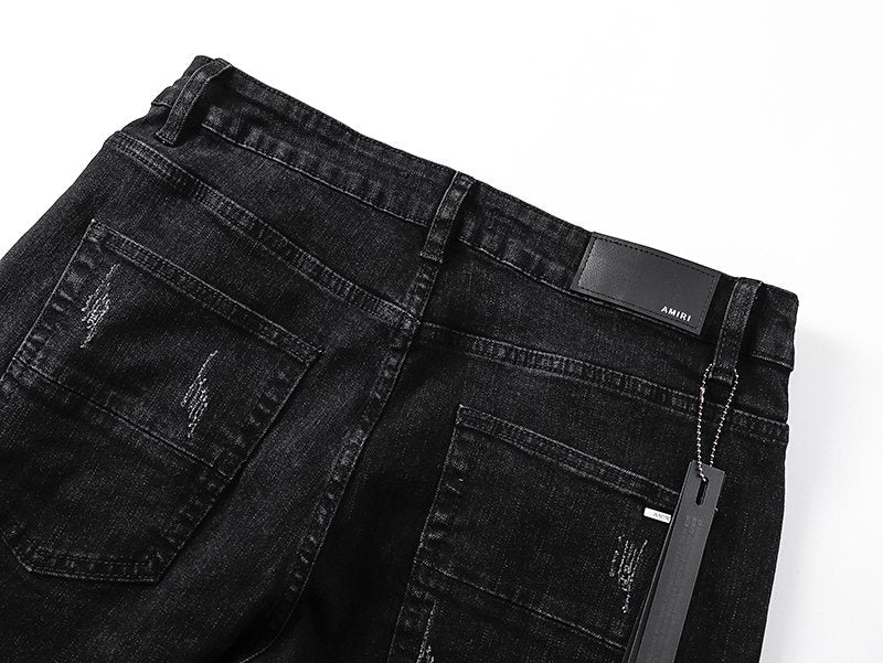 AMIRI Black Distressed Ribbed Knee Jeans ¡ª detail